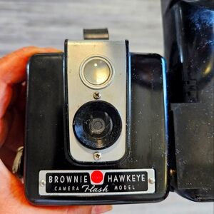 Kodak Brownie Hawkeye camera with flash attachment.